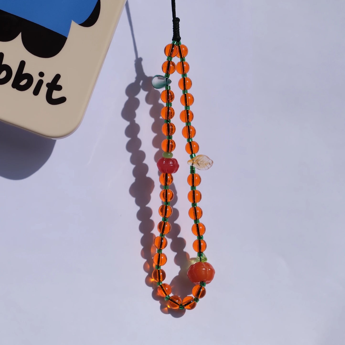 Persimmon Beaded original handmade phone charms and straps with auspicious meaning